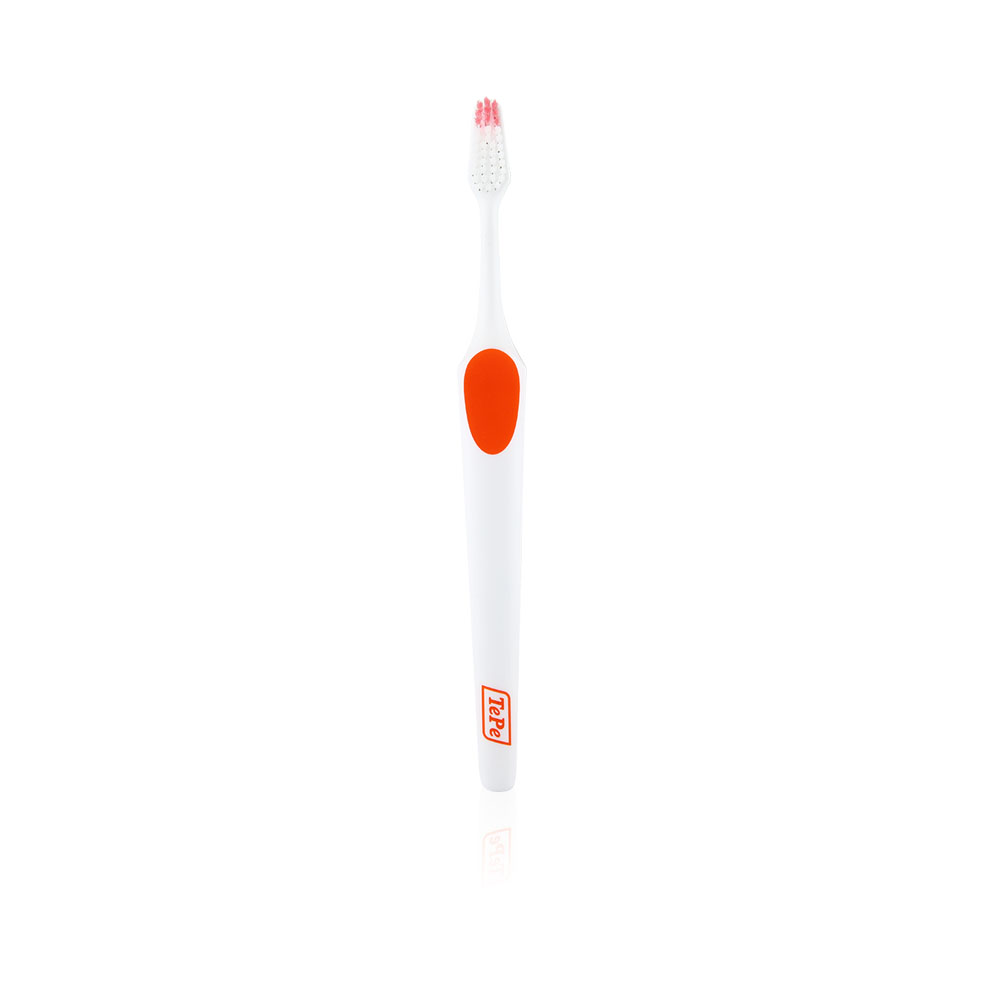Nova Extra Soft White Bristle Toothbrush - White & Orange