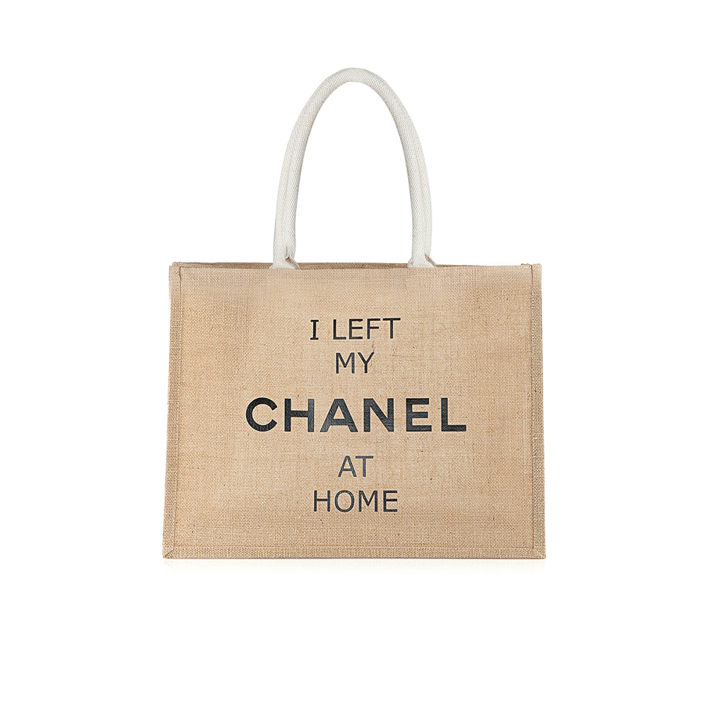 I left my Chanel At Home Hand Bag - Straw